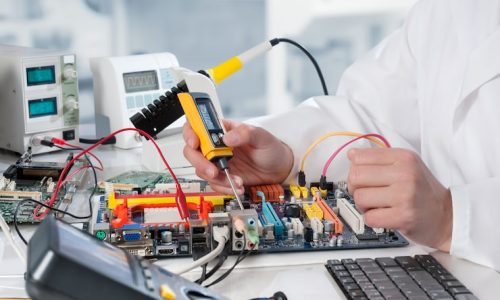 repairman-fixes-electronic-equipment_87646-1342